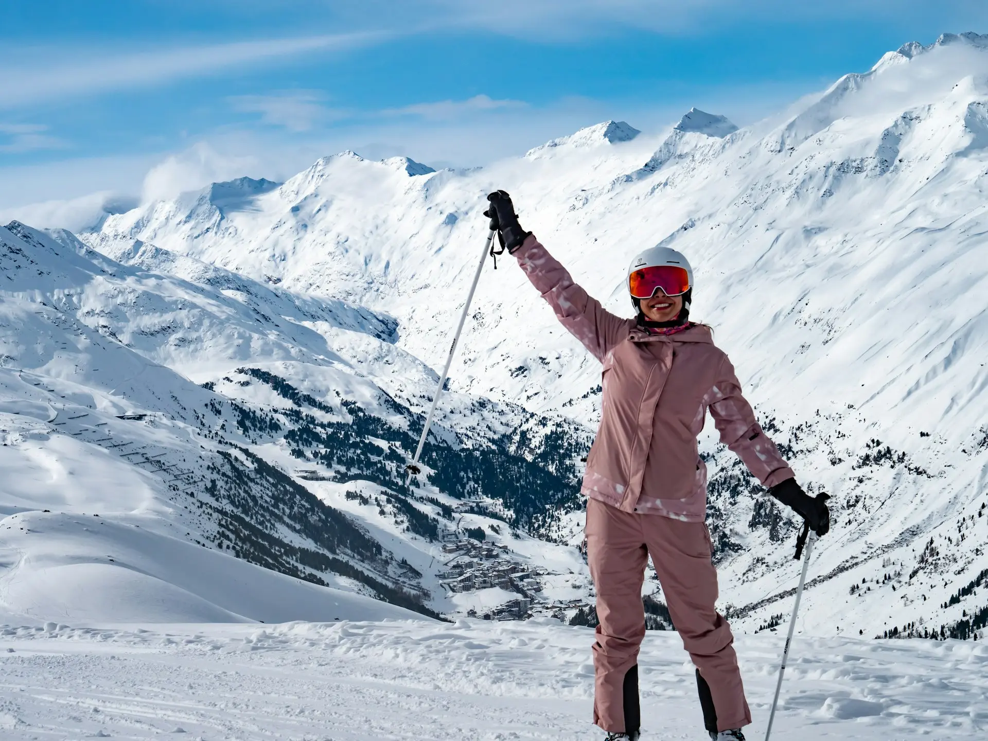 a person on skis on a snowy mountain